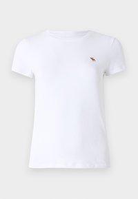 Camiseta blanca de manga corta hecha de algodón, con un pequeño logo de alce marrón en el lado izquierdo del pecho. Diseño clásico de cuello redondo.