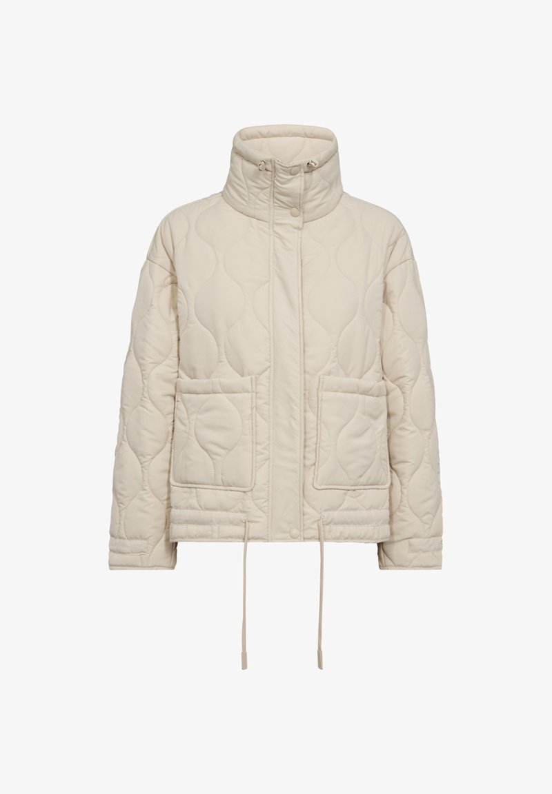 Cream-colored quilted jacket with high collar, front snap buttons, two large front pockets, and adjustable drawstrings at the hem.