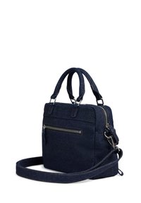 Dark blue denim handbag with two handles, adjustable shoulder strap, front zip pocket, and silver hardware accents. Textured fabric.