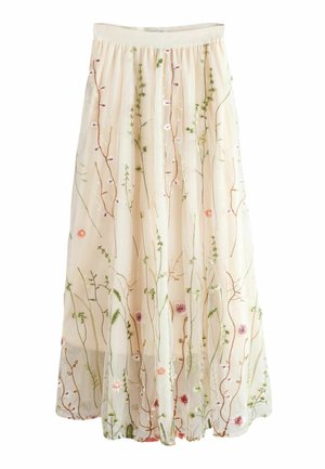 Jupe couleur crème avec surcouche transparente, ornée de vignes florales multicolores brodées et d'une ceinture ajustée.
