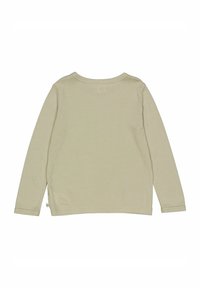 Langärmliges Shirt in hellem Beige, glatte Textur, Rundhalsausschnitt, mit gesticktem Saum und kleinem Etikett an der Seite.