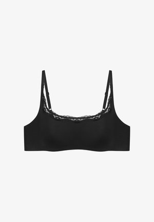 Czarny stanik z miękkiego materiału z koronkowym wykończeniem wokół dekoltu, regulowane ramiączka oraz bezszwowy krój dla wygody.