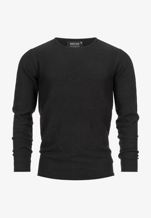 Sort striktrøje med lange ærmer og rund halsudskæring, der har et tekstureret materiale og tætsiddende manchetter, mærket "INDICODE" ved kraven.