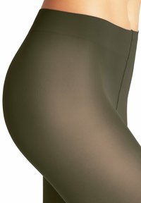 Leggings verde oliva con un design a coste testurizzato, caratterizzati da un alto punto vita e una finitura liscia, che evidenziano una forma aderente.