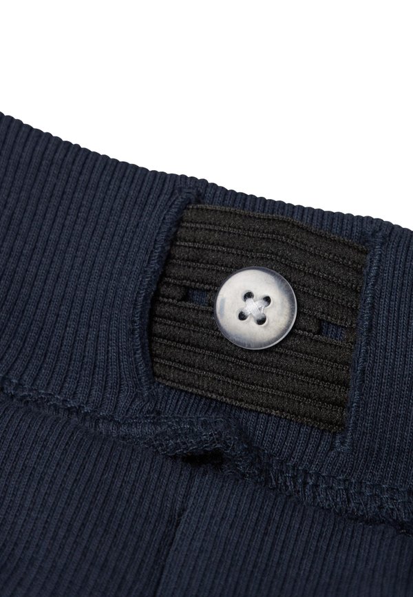 NMMVERMO AOP UNB NOOS - Tracksuit bottoms - dark sapphire aopdinosaurs3