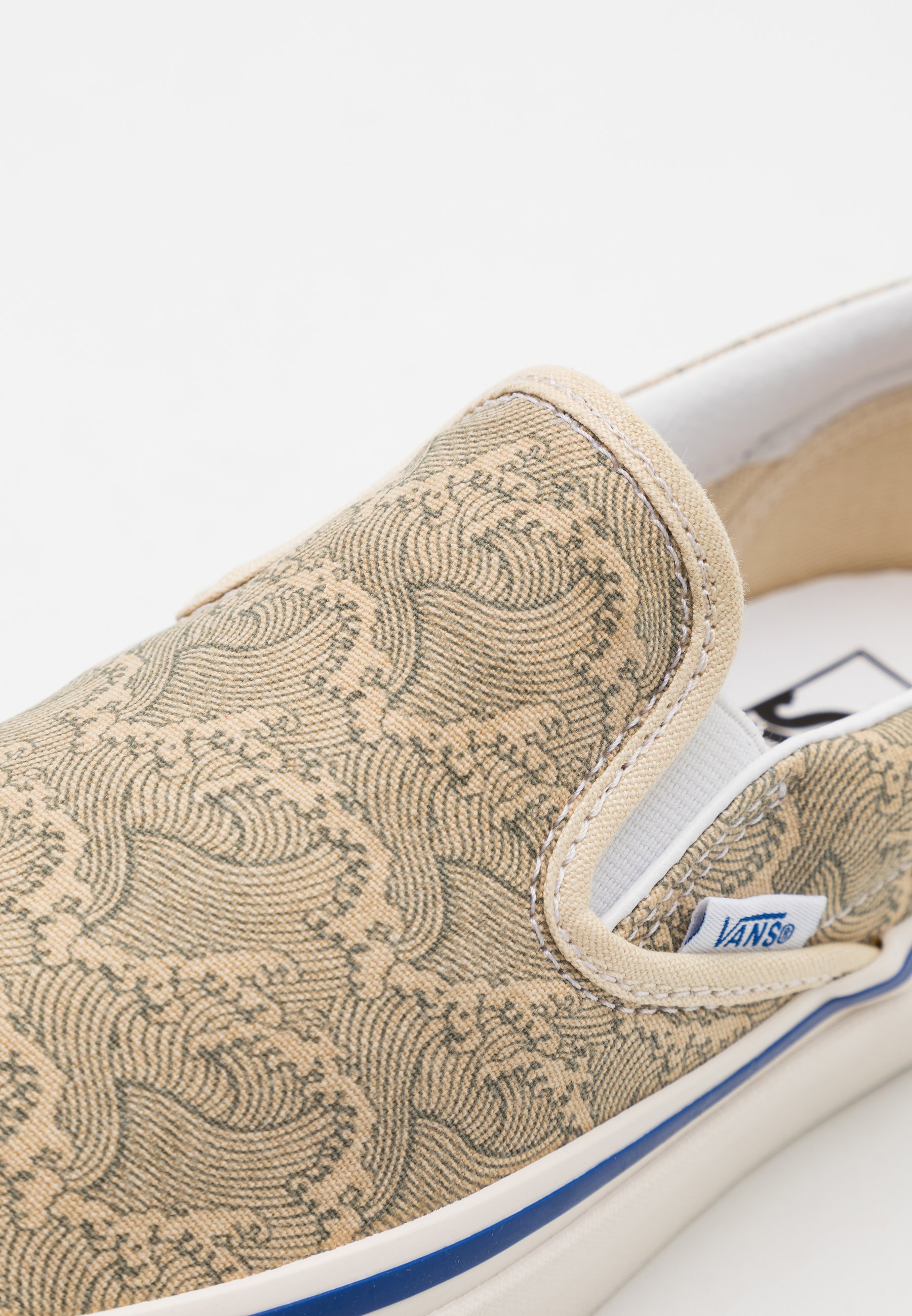 beige vans slip ons