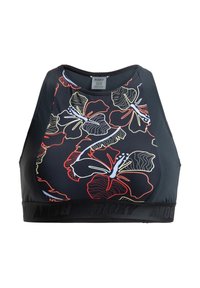 Sujeción deportiva negra con un patrón floral en rojo, amarillo y azul, y una banda elástica texturizada que muestra la marca "ROXY". Diseño clásico de espalda tipo nadador.