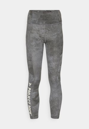 Gray leggings with a textured pattern, featuring a high waistband and the text "PROJECT ROCK" in white on the lower leg.
