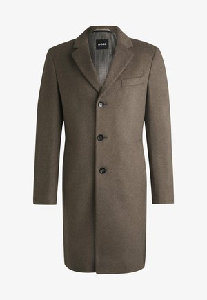 Cappotto in lana marrone con revers, a petto singolo e tre bottoni frontali. Presenta una tasca sul petto e una texture liscia.