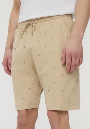 Pantaloni corti beige in misto cotone, dotati di cordoncino, vita elastica e piccola ricamatura di palme marroni su tutta la superficie.