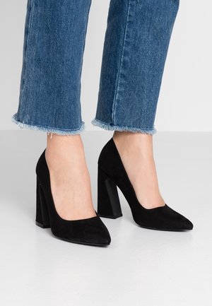 Højhælede pumps - black