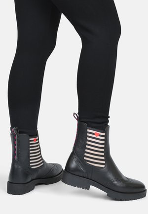 Bottines à plateau - schwarz
