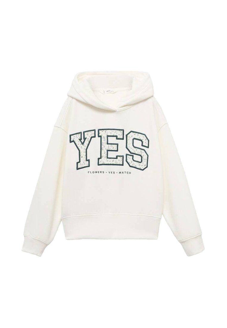 Bela kapuca s velikim grafičnim napisom "DA" v zeleni barvi, ki vključuje cvetlične detajle. Mehka tkanina, dolgi rokavi in ohlapen kroj.