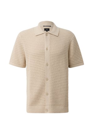 Polo en tricot beige à manches courtes avec motif texturé, devant à boutons et col classique.