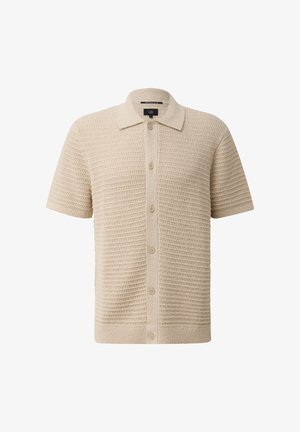 Polo en tricot beige à manches courtes avec motif texturé, devant à boutons et col classique.