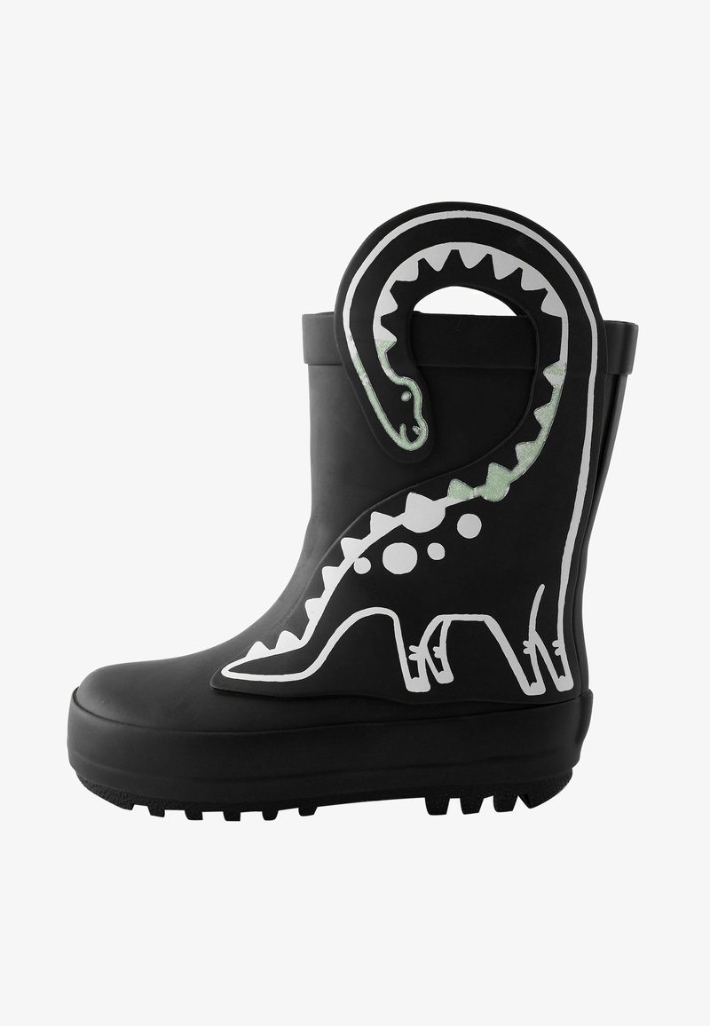 Stivale di gomma nero con un design di dinosauro bianco, dotato di una coda testurizzata e punte lungo il lato, e una suola resistente con grip.