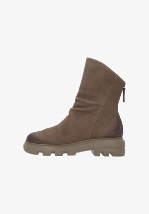 Brown leather ankle boots with a slouch design, textured finish, round toe, and a rugged rubber sole. Features a side zipper for closure.