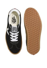 Fekete velúr sneaker fehér fűzőkkel és Vans logóval. Krémszínű talpbetét és gumi külső talp, amely gyémánt mintázattal készült a tapadás érdekében.