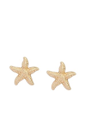 Par de pendientes con forma de estrella de mar en tono dorado, con superficie texturizada y cinco brazos, sobre fondo blanco.
