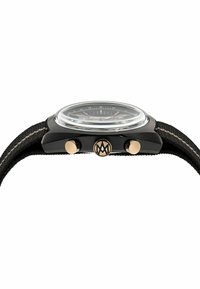 Orologio cronografo nero con cinturino texturizzato, dettagli dorati sui pulsanti e sulla corona, e un quadrante in vetro trasparente che mostra indicatori delle ore in argento.