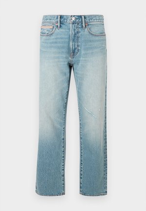 Lyseblå denim jeans med rette ben, falmet effekt og et lite slitt parti. Har en tradisjonell fem-lommers design og midjestilling.
