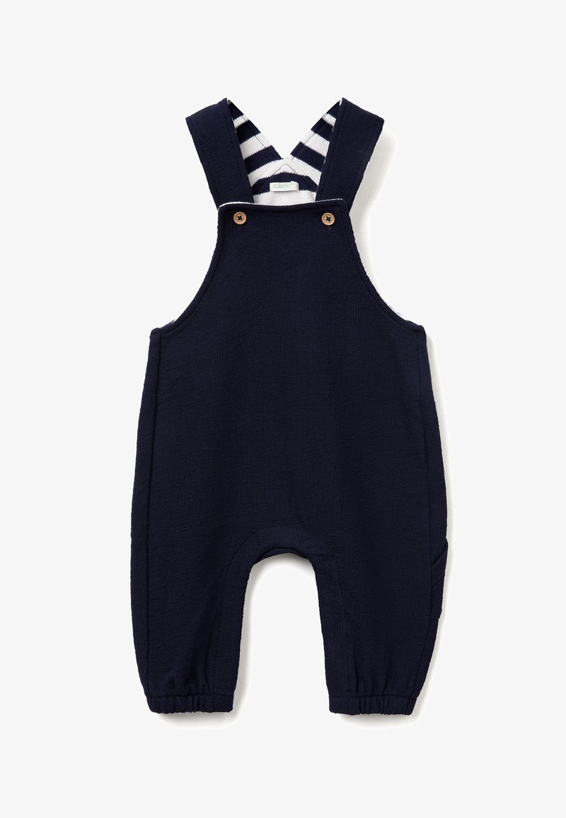 Salopette blu navy in tessuto testurizzato, con spalline regolabili a righe, bottoni in legno e tasche laterali. Aperture per i piedi arrotondate con polsini elasticizzati.