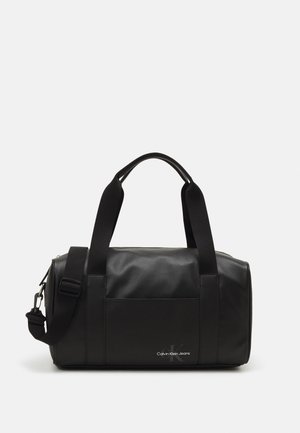 Calvin Klein Jeans MONOGRAM SOFT FLIGHT DUFFLE UNISEX - Torba za vikend - black