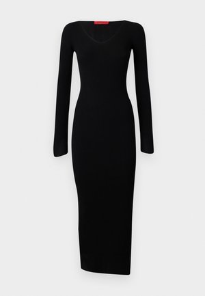 Black, ribbed long-sleeve dress with a V-neckline, fitted bodice, and straight hem, made from stretch fabric for a form-fitted silhouette.