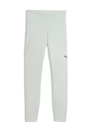 Leggings de sport gris clair avec une large ceinture, des poches latérales et un petit logo Puma noir sur la cuisse droite.