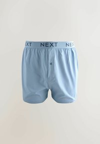 Svetlomodré boxerky s jemnou textúrou, elastickým pásom s označením "NEXT" a zapínaním na gombík vpredu.