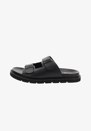 Sandale à glissière noire avec deux brides ajustables à boucle et une semelle striée, vue de côté.