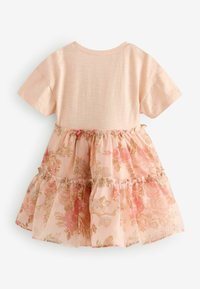 Rosa Kleid mit solidem Oberteil und einem gestuften Rock mit floralen Mustern und Rüschensaum. Aus weichem Stoff mit kurzen Ärmeln gefertigt.