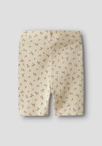Bež kratke hlače s rebrastom teksturom, ukrašene malim cvjetnim uzorcima u zelenoj i smeđoj boji, dizajnirane s elastičnom gumicom u struku.