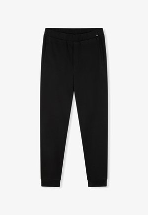 Pantalones de chándal negros confeccionados en una tela suave, con una cinturilla elástica, dos bolsillos laterales, piernas ajustadas y puños acanalados en los tobillos.