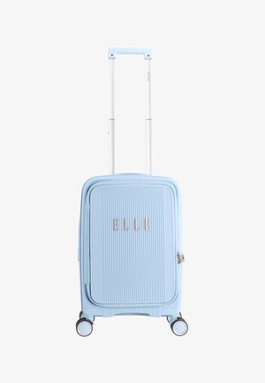 Blue hardshell suitcase with vertical ribbed texture, silver hardware, and double wheels. Features a telescopic handle and branded front.