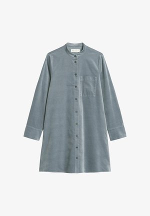 Light blue corduroy shirt dress with a band collar, front button closure, long sleeves, and a chest pocket. Smooth texture with subtle sheen.