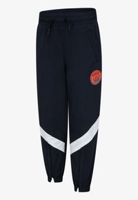 Námořnické sportovní kalhoty s bílým diagonálním proužkem, elastickým pasem a tkaničkou. Na levém stehně se nachází kulaté oranžové logo.