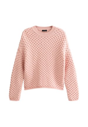 Jersey rosa claro con un patrón texturizado de pompones, cuello redondo y mangas largas con puños y bajo acanalados.