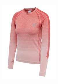 Langærmet sportstrøje i gradient røde nuancer. Lavet af blødt stof med ribbet halsudskæring og tommelhuller. Har et diskret logo på brystet.