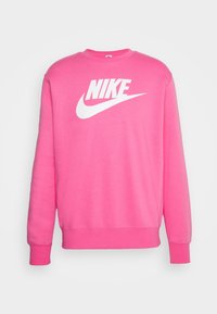 Rosa Nike-tröja i mjukt material, med en vit logotyp på framsidan, rund halsringning och långa ärmar med åtsittande mudd.
