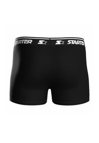 Boxers negros hechos de tela suave, con una cinturilla elástica ancha que lleva el logotipo "STARTER" en blanco, y un diseño ajustado.
