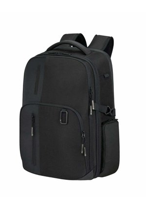 Black fabric backpack with multiple zippered pockets, padded shoulder straps, and a side pocket. Features a sleek, structured design.