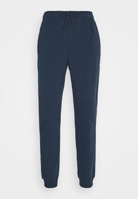 Marineblaue Sweatpants aus weichem Baumwollmaterial. Sie verfügen über einen elastischen Bund mit Kordelzug, Bündchen an den Säumen und einen entspannten Schnitt.