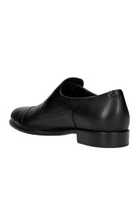 Schwarzer Lederschuh mit runder Zehenpartie, glatter Textur und subtiler Stickdetail. Verfügt über einen niedrigen Absatz und einslip-on Design für einfaches Anziehen.
