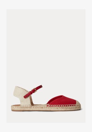Flat espadrille sandal with red fabric front, braided natural sole, woven cream back, and adjustable red ankle strap with gold buckle.