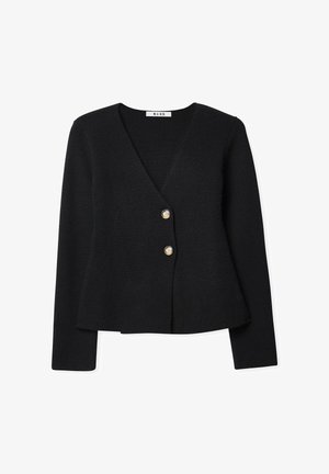 Črn pleten cardigan z dolgimi rokavi, V-izrezom in dvema zlatima gumboma spredaj. Mehka tekstura z strukturiranim krojem in razširjenim robom.
