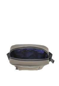 Borsa in nylon grigia con zip sulla parte superiore. L'interno presenta una fodera blu scuro, dettagli di doppio cucitura e una tracolla per il trasporto.