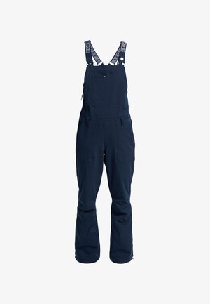 Marineblaue Skioveralls mit verstellbaren Trägern, einer Fronttasche und seitlichen Reißverschlüssen, gefertigt aus robustem Stoff für Outdoor-Aktivitäten.