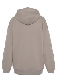 Licht beige hoodie van een zachte katoenmix. Heeft een grote capuchon, doorgezakte schouders en ribgebreide manchetten en zoom. Alleen achteraanzicht.