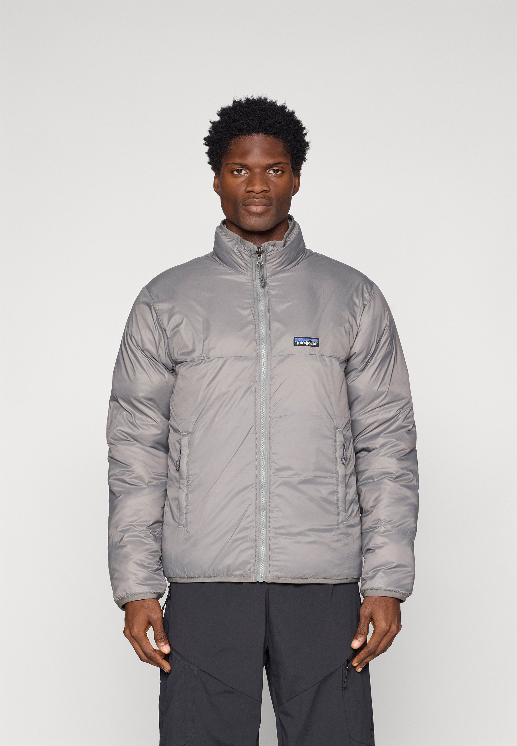 Patagonia REVERSIBLE BETTER SWEATER - Down jacket - stonewash